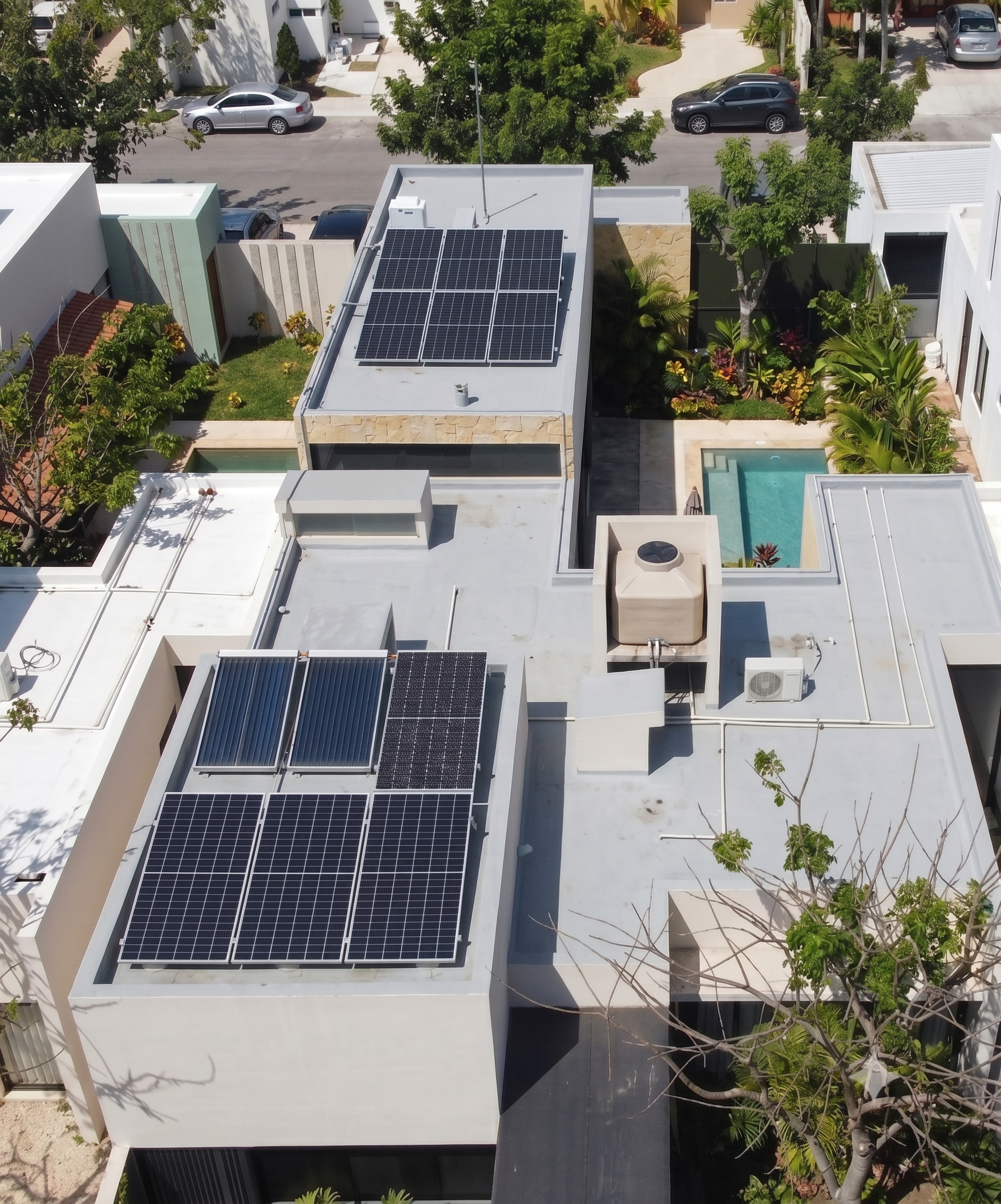 Kit Ahorro Urbano - Vista aérea de casas con paneles solares